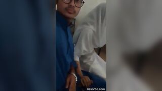 Cute young muslin girl giving handjob to her bf in college room