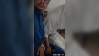 Cute young muslin girl giving handjob to her bf in college room