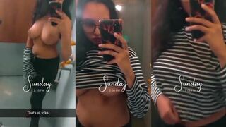Horny babe making boobs mirror selfie